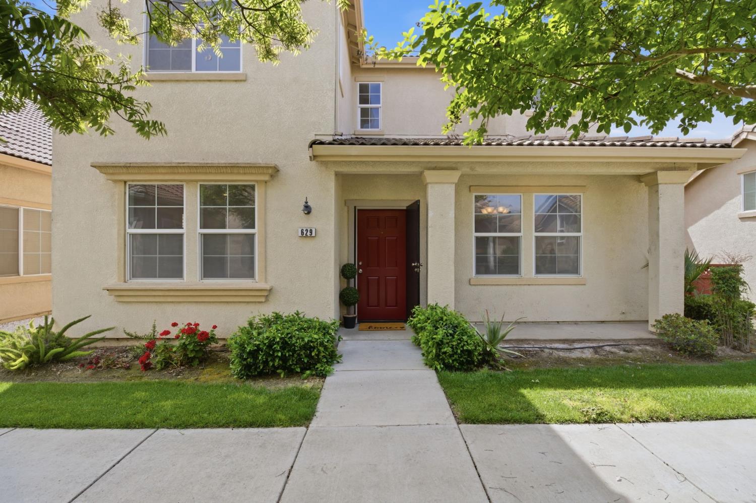 Front elevation of a home listed by Naomi Townsend in Los Banos